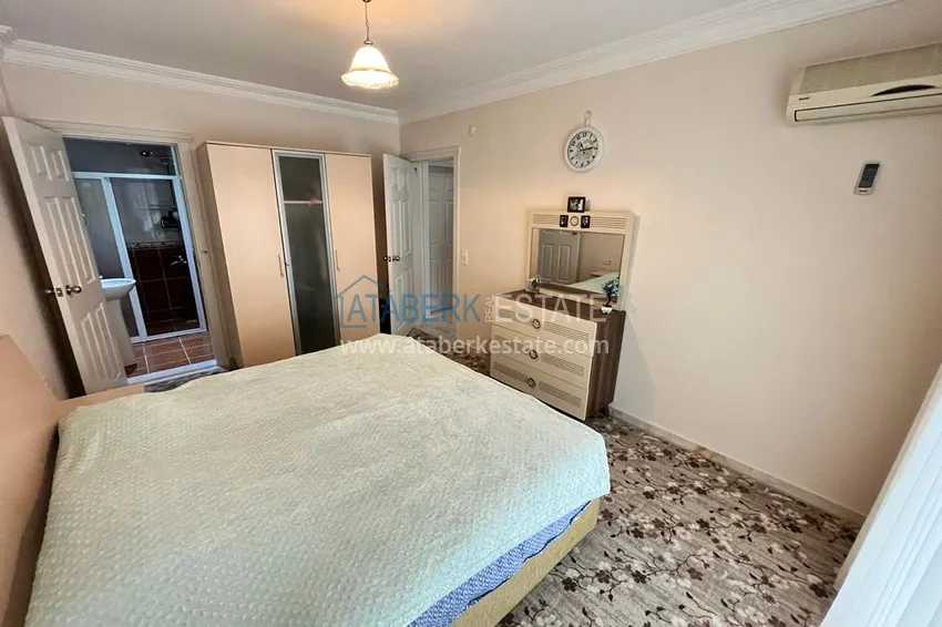 Приобрести Квартира в районе Махмутлар с мебелью и видом на море в жилом комплексе с бассейном  13 