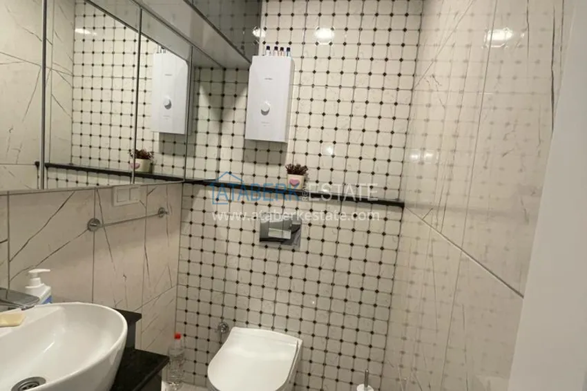 Приобрести Квартира в районе Оба двухкомнатная с мебелью в уютном жилом комплексе 11 