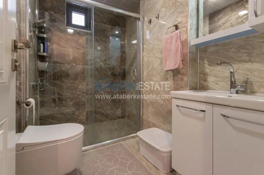 Приобрести Квартира в районе Махмутлар с мебелью и застекленными балконами в новом комплексе 15 