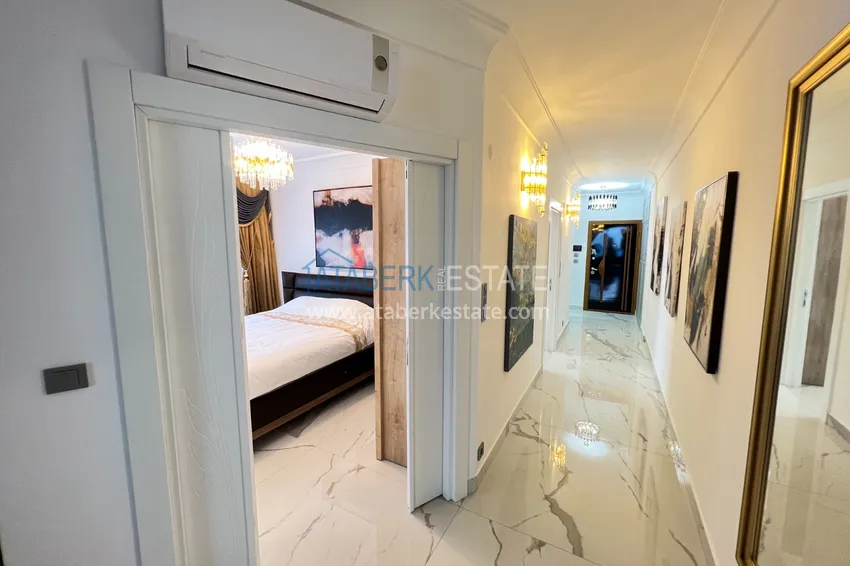 Приобрести Квартира в Махмутларе с дизайнерским интерьером и прямым видом на море  18 