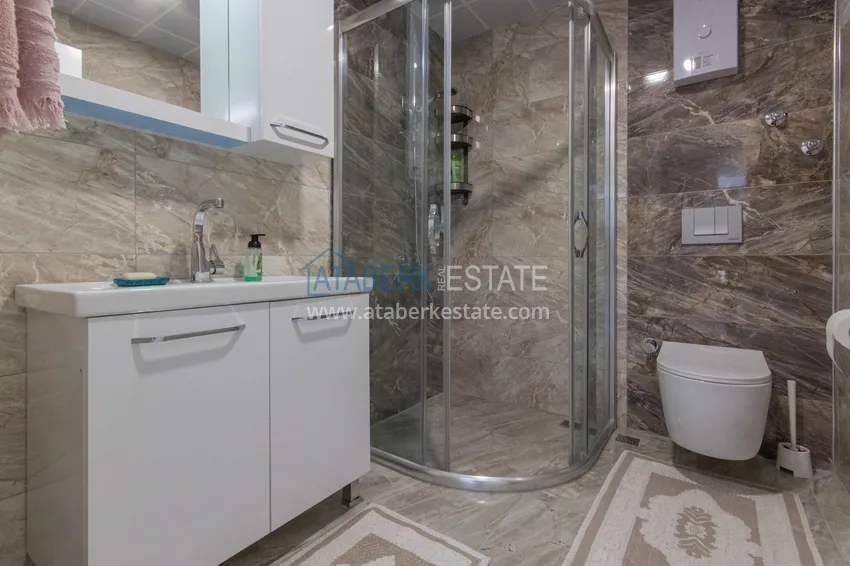 Приобрести Квартира в районе Махмутлар с мебелью и застекленными балконами в новом комплексе 16 