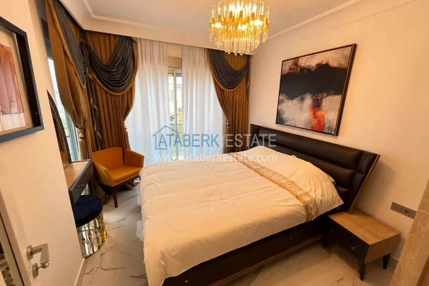 Приобрести Квартира в Махмутларе с дизайнерским интерьером и прямым видом на море  19 