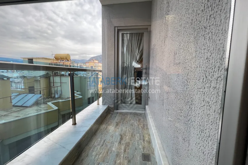 Приобрести Квартира в Махмутларе с дизайнерским интерьером и прямым видом на море  21 