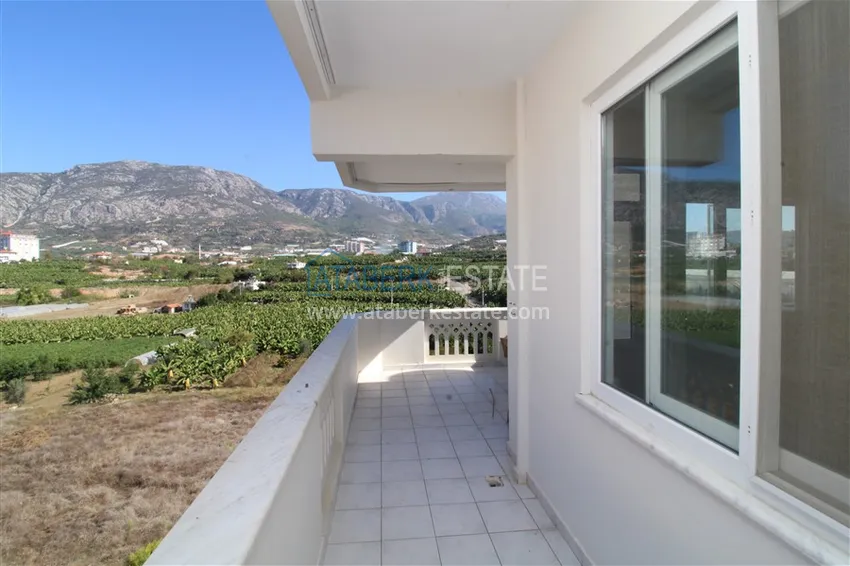 Приобрести Квартира в Махмутларе трехкомнатная, с отдельной кухней и видом на горы 14 