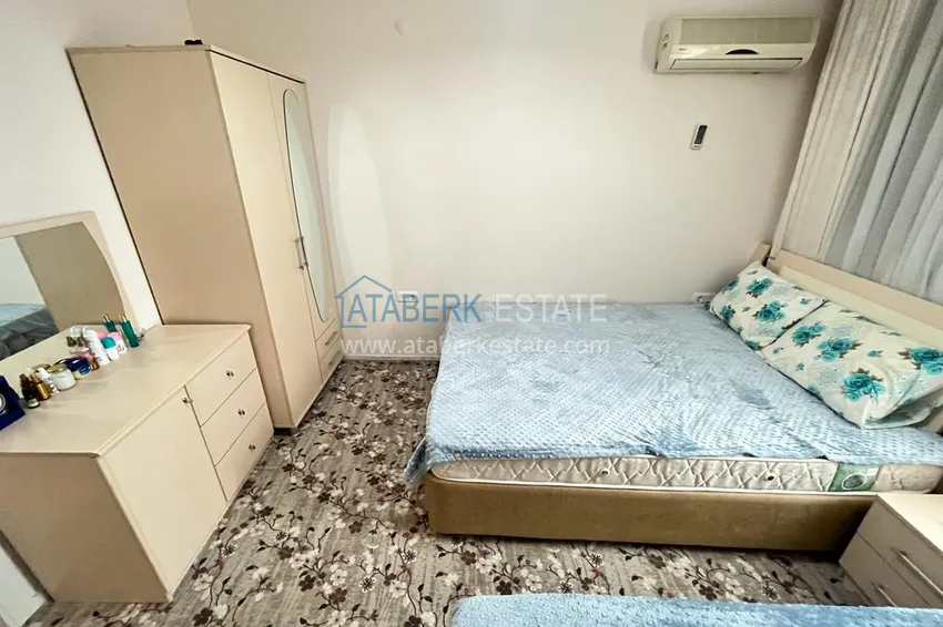 Приобрести Квартира в районе Махмутлар с мебелью и видом на море в жилом комплексе с бассейном  17 