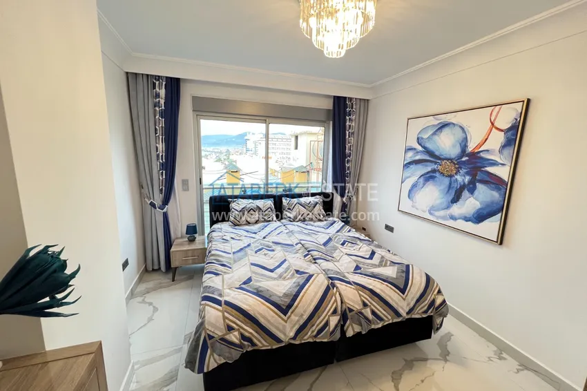 Приобрести Квартира в Махмутларе с дизайнерским интерьером и прямым видом на море  22 