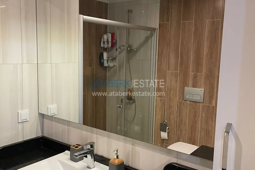 Приобрести Квартира в Махмутлар с мебелью, застекленным балконом и видом на море  18 