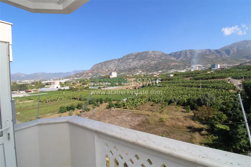 Приобрести Квартира в Махмутларе трехкомнатная, с отдельной кухней и видом на горы 15 