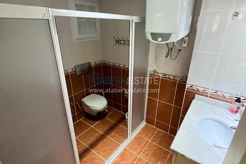 Приобрести Квартира в районе Махмутлар с мебелью и видом на море в жилом комплексе с бассейном  18 