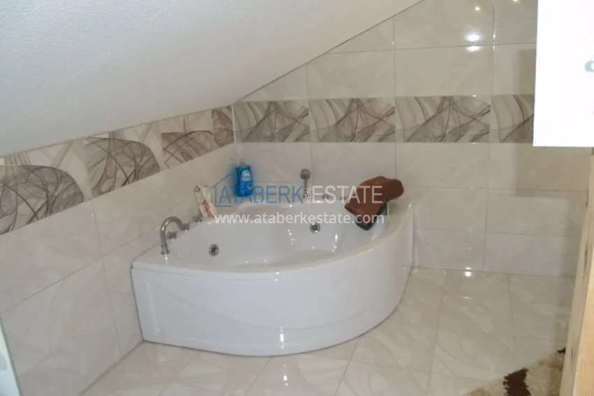 Приобрести Вилла в Алании, район Тюрклер с мебелью и бассейном на крыше 18 