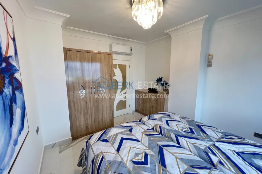 Приобрести Квартира в Махмутларе с дизайнерским интерьером и прямым видом на море  24 