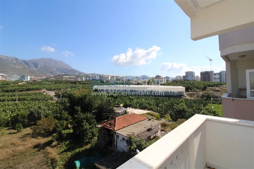 Приобрести Квартира в Махмутларе трехкомнатная, с отдельной кухней и видом на горы 18 