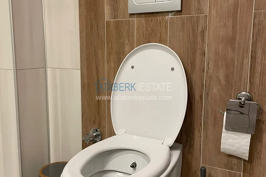 Приобрести Квартира в Махмутлар с мебелью, застекленным балконом и видом на море  22 