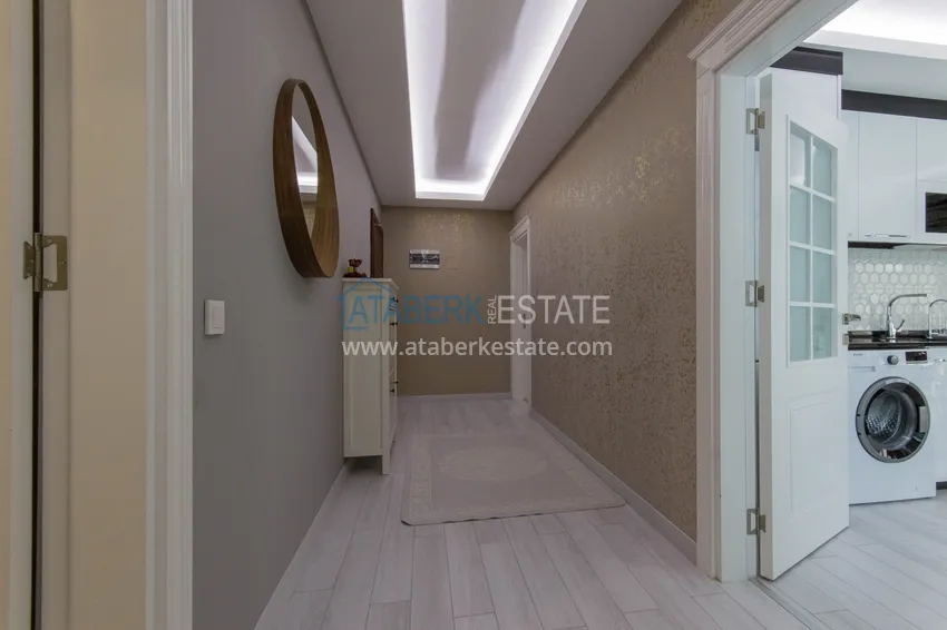 Приобрести Квартира в районе Махмутлар с мебелью и застекленными балконами в новом комплексе 1 