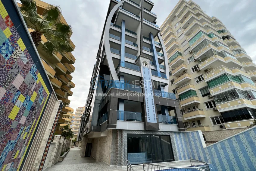 Квартира в Махмутларе с дизайнерским интерьером и прямым видом на море  1 