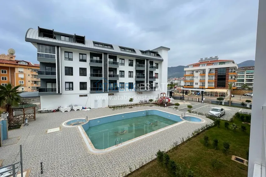 Квартира в районе Оба двухкомнатная с мебелью в уютном жилом комплексе 1 