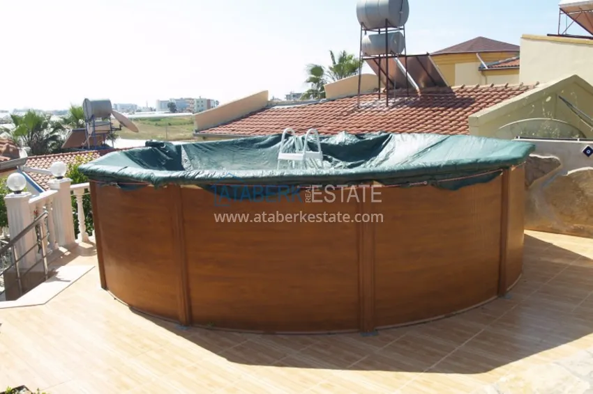 Приобрести Вилла в Алании, район Тюрклер с мебелью и бассейном на крыше 21 