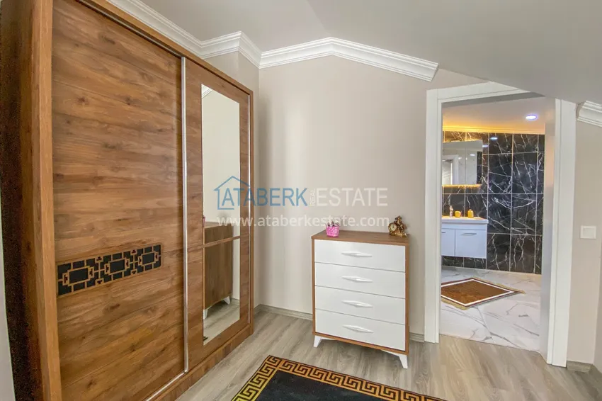 Приобрести Квартиры и пентхаусы в районе Демирташ со стильным интерьером в новостройке 70 