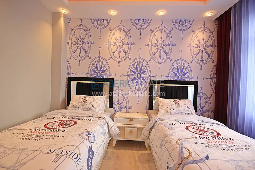 Приобрести Квартира в Махмутларе первая береговая линия, эксклюзивная мебель, открытый вид на море 25 