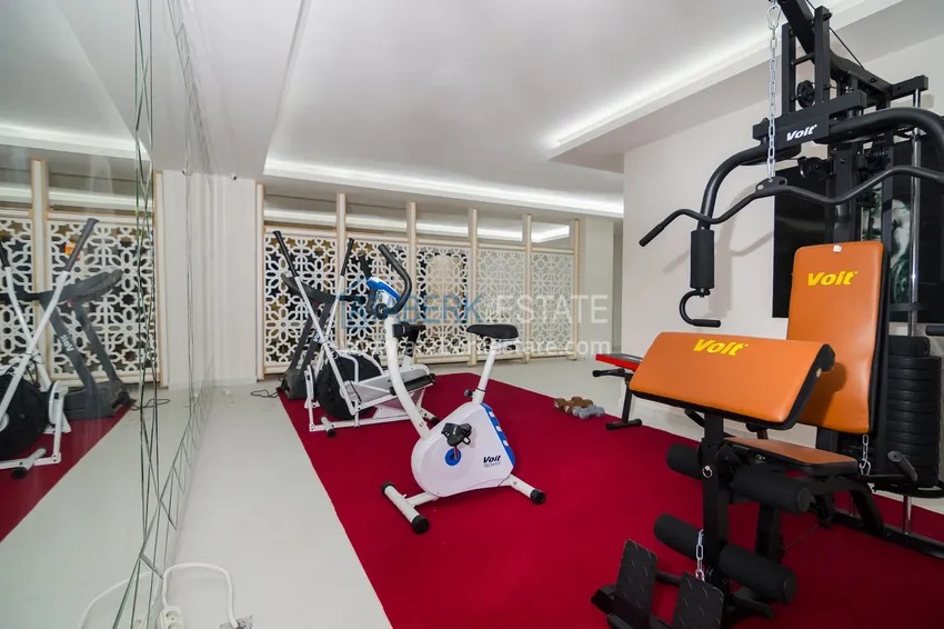 Квартира в районе Махмутлар с мебелью и застекленными балконами в новом комплексе 24 