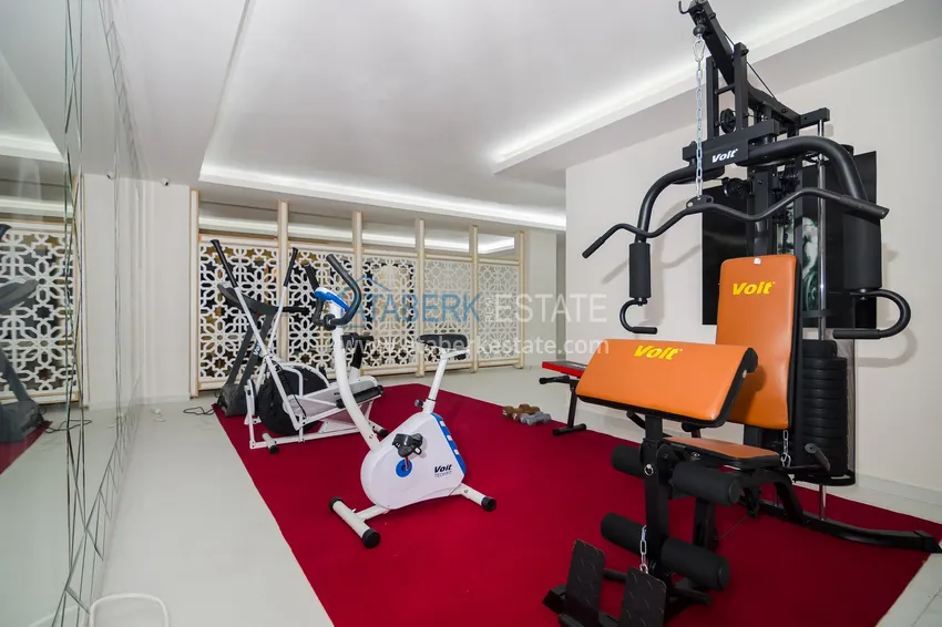 Квартира в районе Махмутлар с мебелью и застекленными балконами в новом комплексе 25 