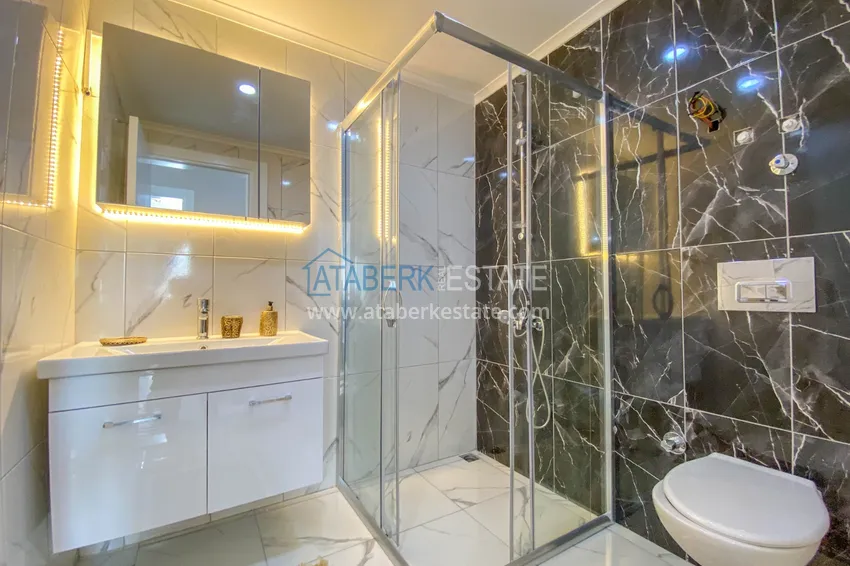 Приобрести Квартиры и пентхаусы в районе Демирташ со стильным интерьером в новостройке 75 