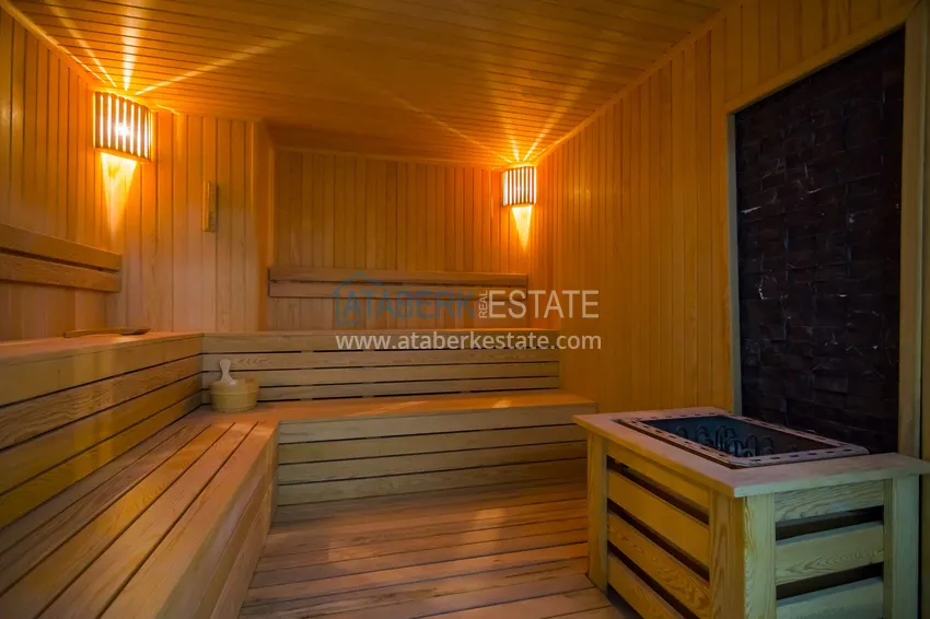 Квартира в районе Махмутлар с мебелью и застекленными балконами в новом комплексе 27 