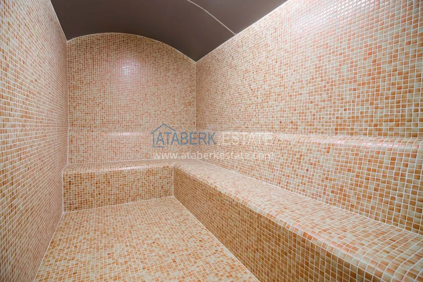 Квартира в районе Махмутлар с мебелью и застекленными балконами в новом комплексе 28 