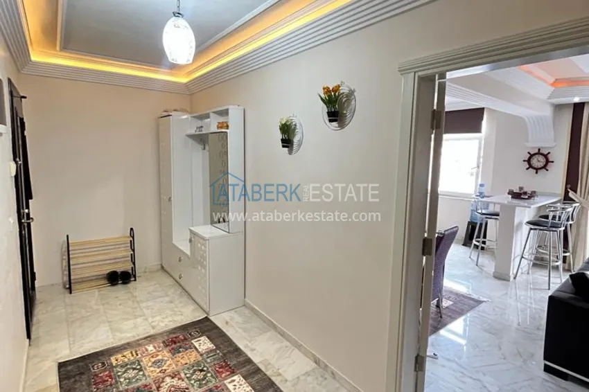 Приобрести Квартира в районе Махмутлар с мебелью и видом на море в жилом комплексе с бассейном  3 