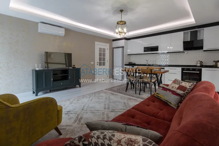 Приобрести Квартира в районе Махмутлар с мебелью и застекленными балконами в новом комплексе 2 