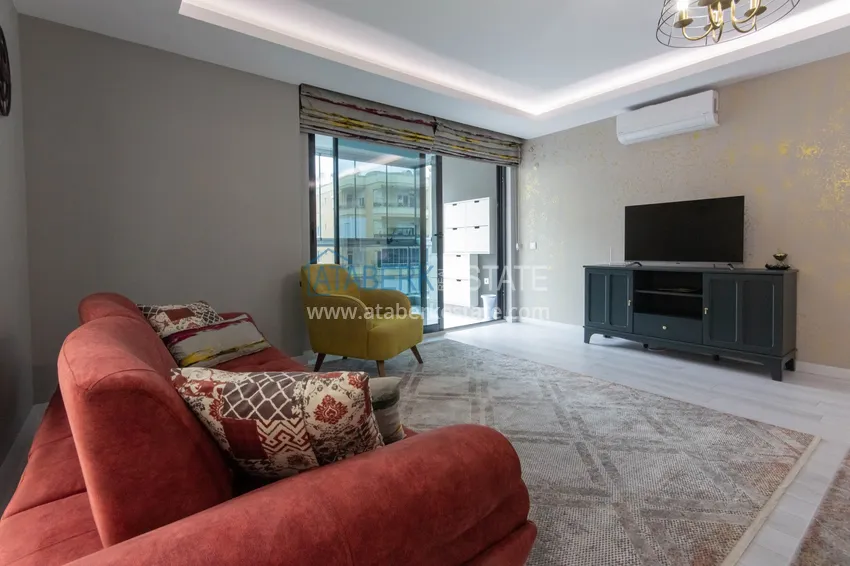 Приобрести Квартира в районе Махмутлар с мебелью и застекленными балконами в новом комплексе 3 