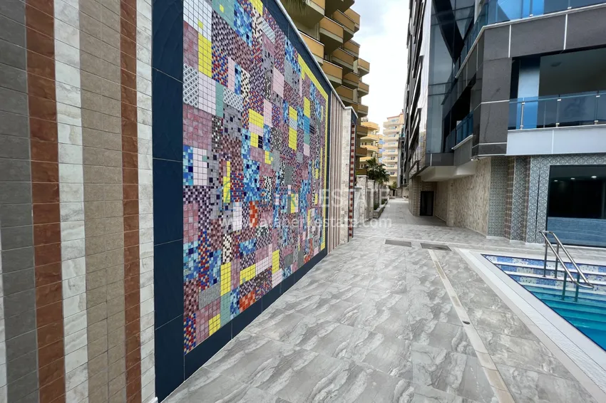 Квартира в Махмутларе с дизайнерским интерьером и прямым видом на море  4 