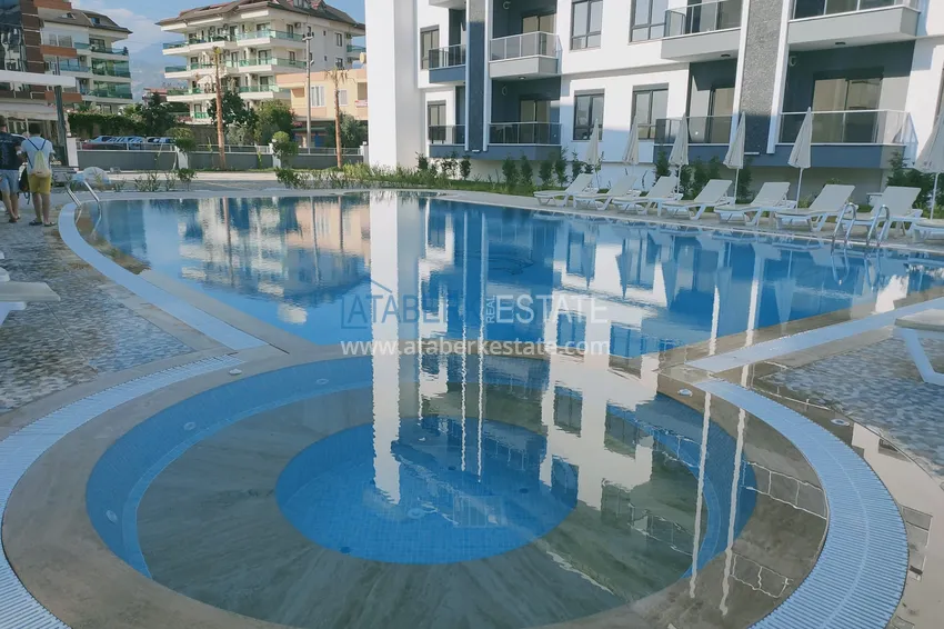 Квартира в районе Оба двухкомнатная с мебелью в уютном жилом комплексе 4 