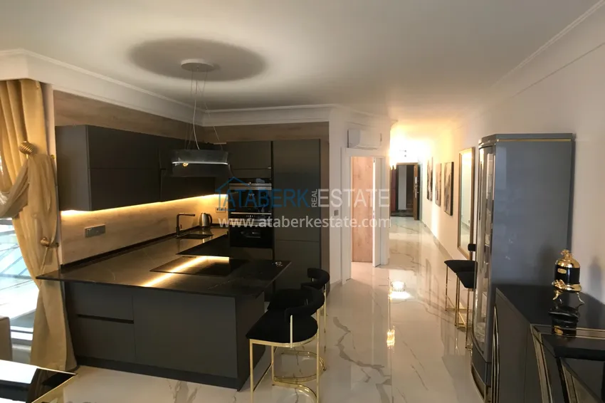 Приобрести Квартира в Махмутларе с дизайнерским интерьером и прямым видом на море  6 