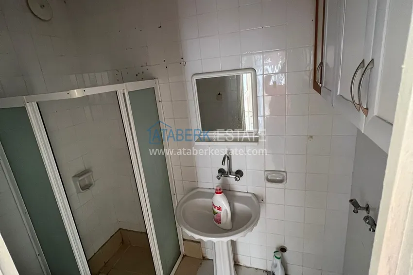 Приобрести Квартира в Махмутларе трехкомнатная в жилом комплексе рядом с морем 6 