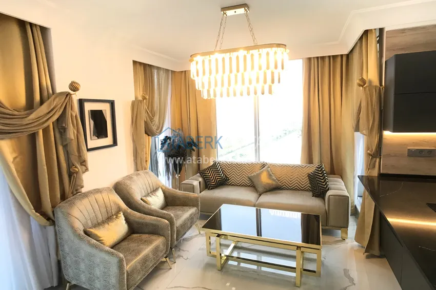 Приобрести Квартира в Махмутларе с дизайнерским интерьером и прямым видом на море  9 