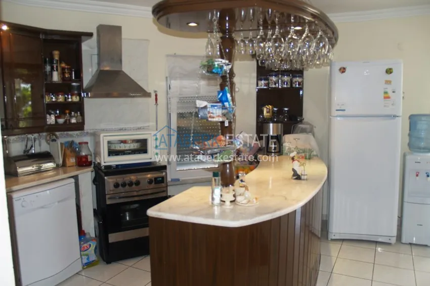 Приобрести Вилла в Алании, район Тюрклер с мебелью и бассейном на крыше 8 