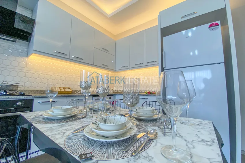 Приобрести Квартиры и пентхаусы в районе Демирташ со стильным интерьером в новостройке 7 