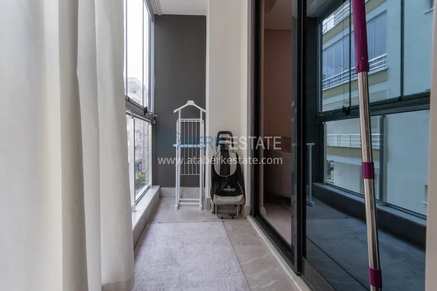 Приобрести Квартира в районе Махмутлар с мебелью и застекленными балконами в новом комплексе 11 