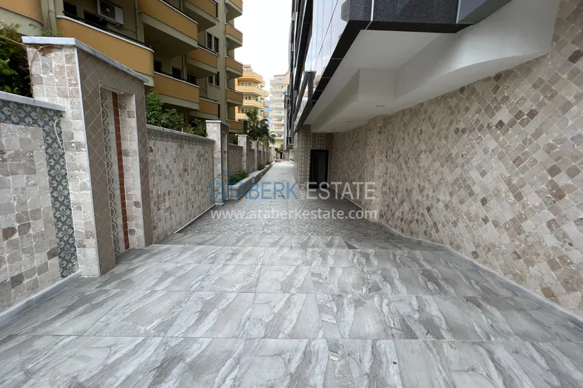 Квартира в Махмутларе с дизайнерским интерьером и прямым видом на море  8 