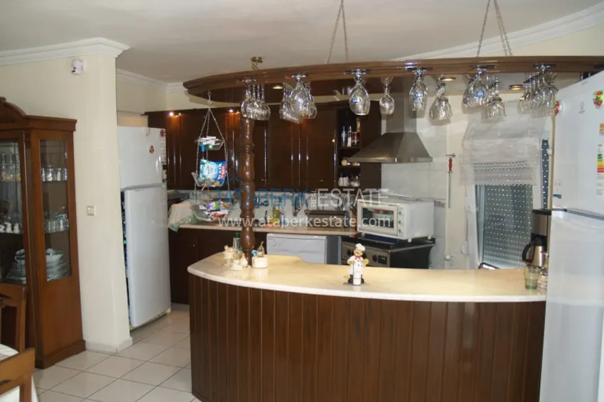 Приобрести Вилла в Алании, район Тюрклер с мебелью и бассейном на крыше 9 