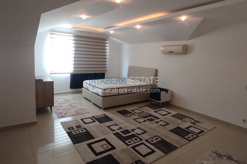 Приобрести Квартиры-пентхаусы в Алании с мебелью, район пляжа Клеопатра  11 