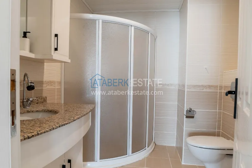 Приобрести Квартира в Махмутларе с мебелью и видом на горы в благоустроенном комплексе 11 