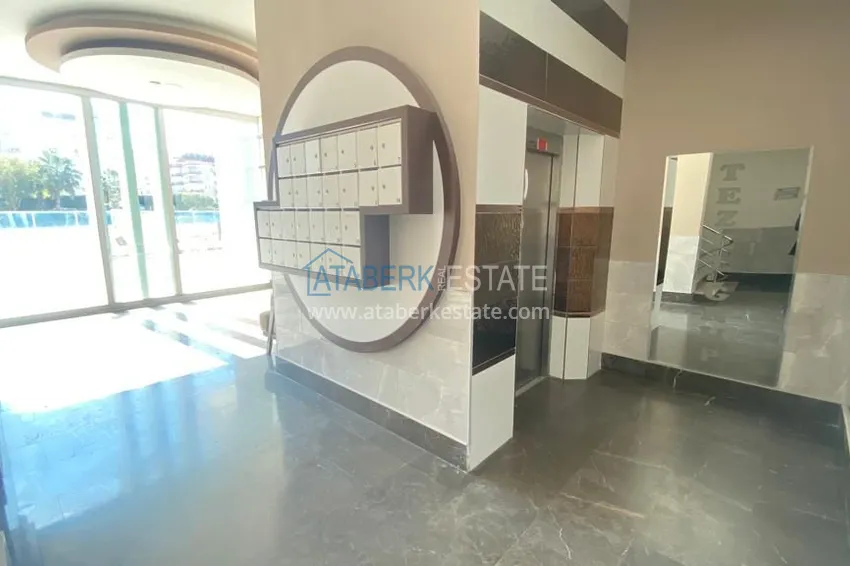 Квартира в Махмутларе – центр района с мебелью и отдельной кухней  10 