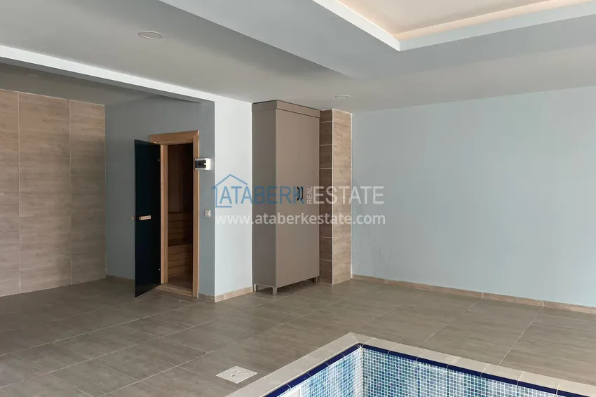 Квартира в Алании - район Авсаллар с чистовой отделкой  10 