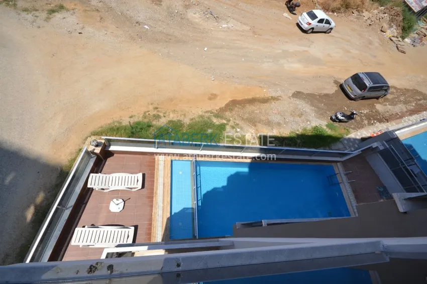 Приобрести Квартира в Махмутларе двухкомнатная с чистовой отделкой. Новостройки Алании 14 