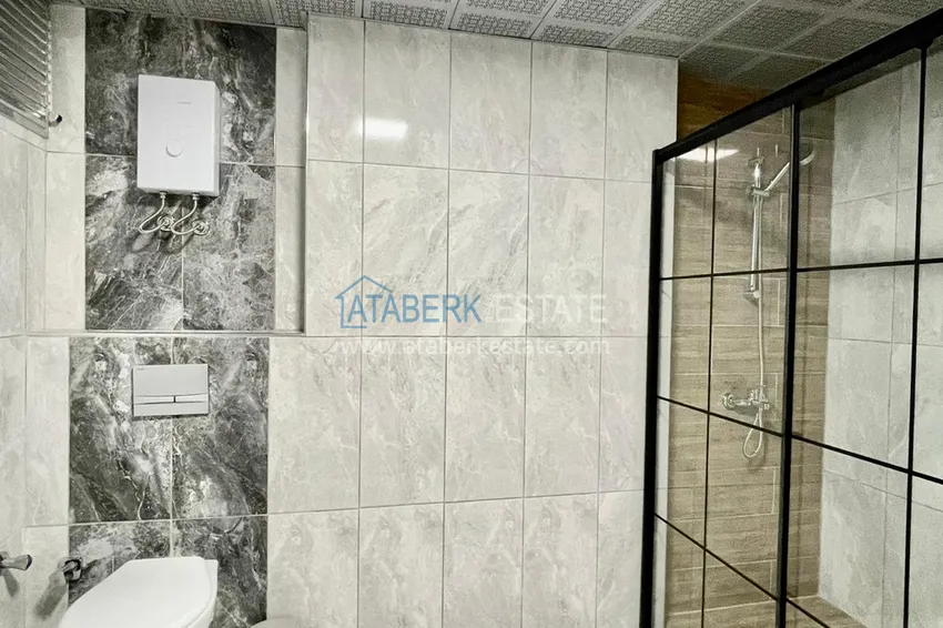 Приобрести Квартира в центре Алании – район пляжа Клеопатра с новой мебелью и видом на море 14