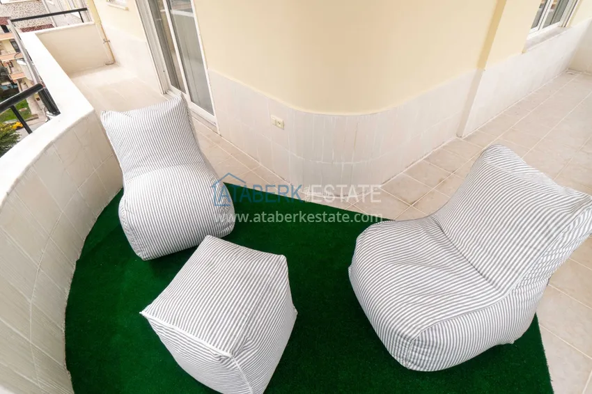 Приобрести Квартира в Махмутларе с мебелью и видом на горы в благоустроенном комплексе 15 