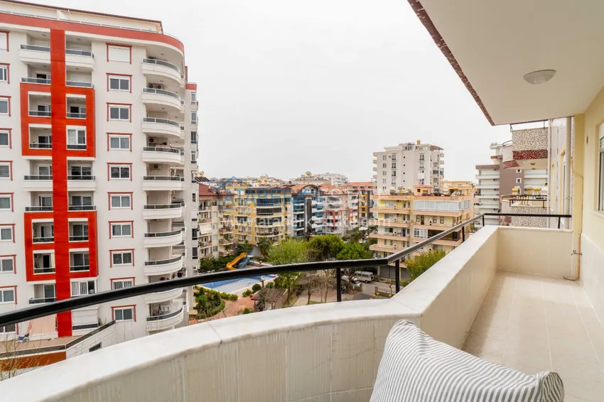 Приобрести Квартира в Махмутларе с мебелью и видом на горы в благоустроенном комплексе 16 