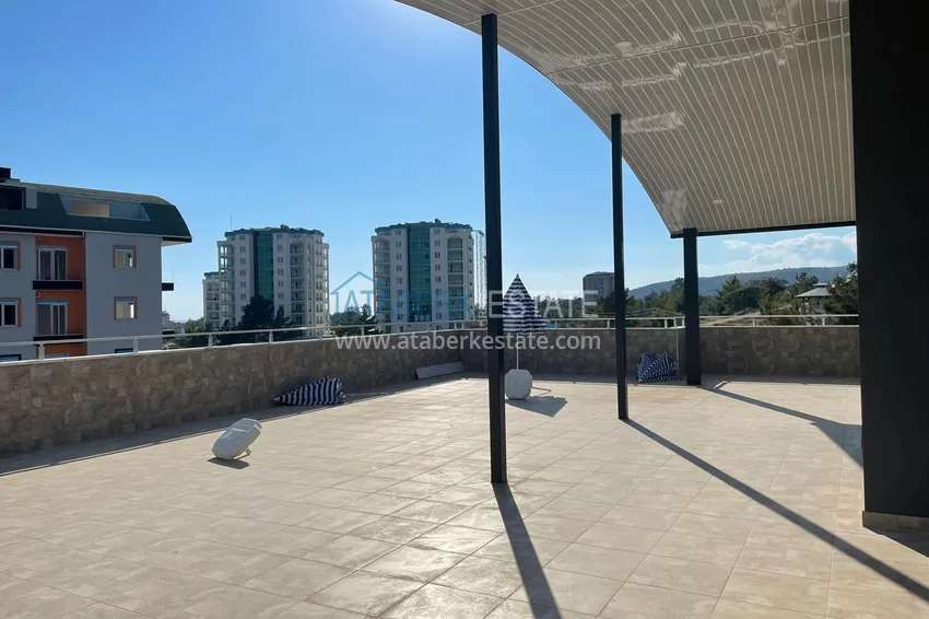 Квартира в Алании - район Авсаллар с чистовой отделкой  16 